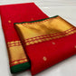 Red Chanderi saree with narrow deep green border edge