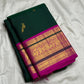 Magenta korvai border with gold zari vanasringaram animal panels on emerald green saree — Idam Living