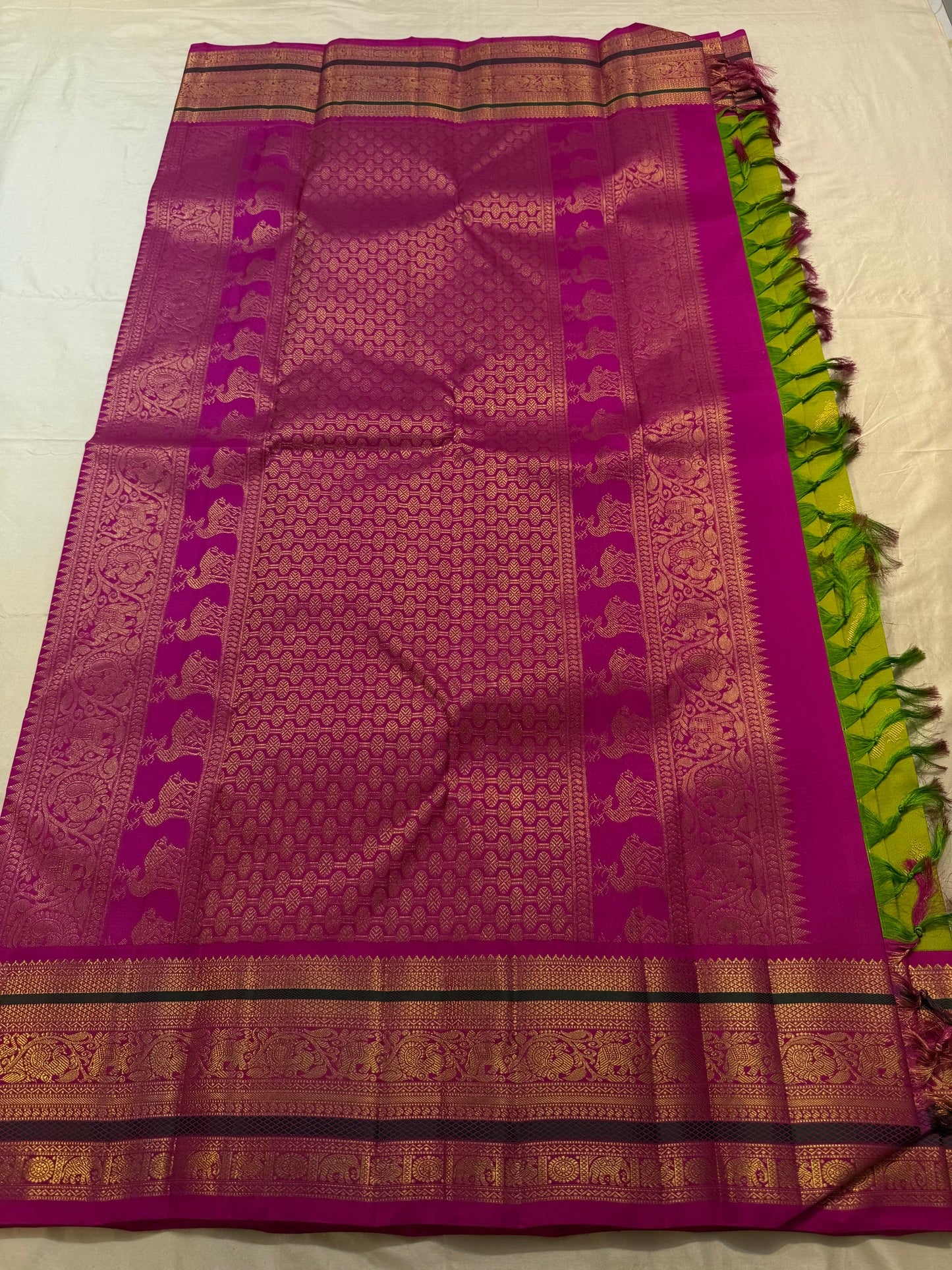 Folded view of parrot green and magenta butta Kanjeevaram silk saree with mayil peacock butta — Idam Living