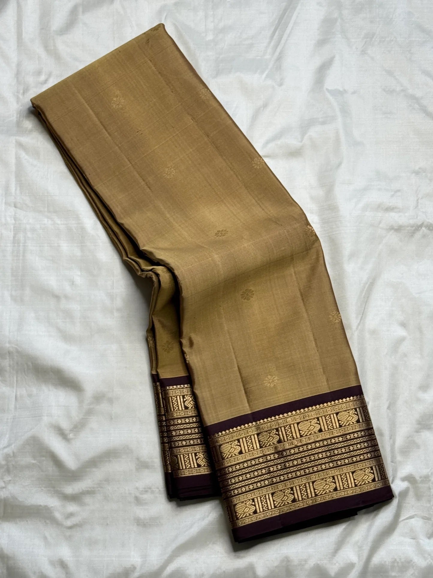Gold zari kamalam butta detail on antique brass beige Kanchipuram silk saree body — Idam Living