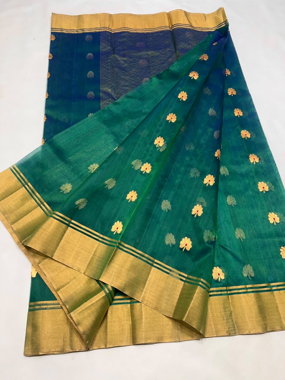 Gold floral buttas woven on peacock teal Katan Silk Chanderi