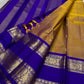 Handwoven antique gold Kanchipuram silk saree draped view