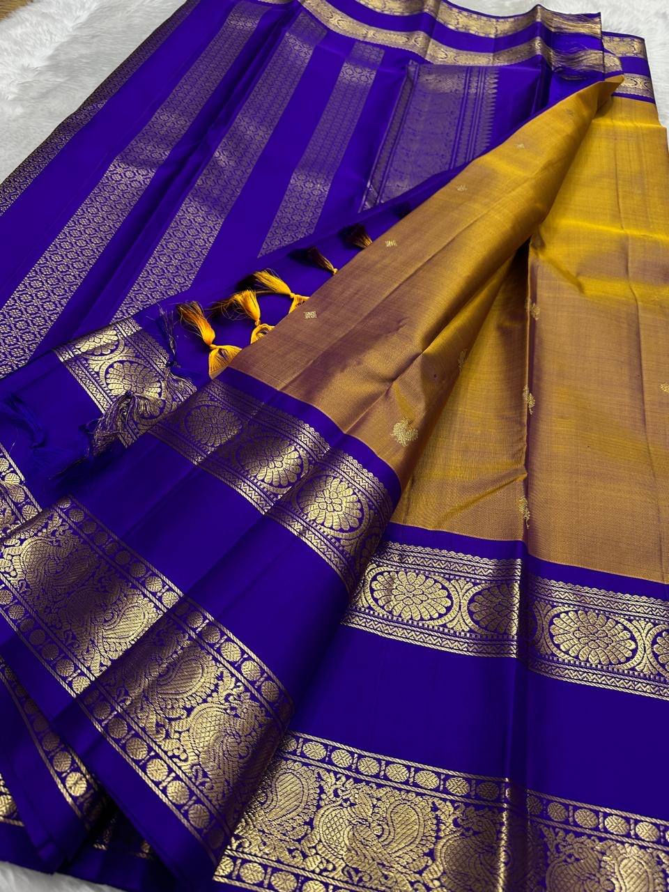 Handwoven antique gold Kanchipuram silk saree draped view