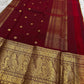 Mustard-gold Kanchipuram Zari Kattam with lotus-inspired Kamalam zari buttas.