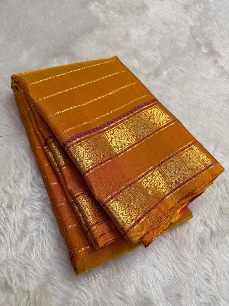mustard gold Kanchipuram silk saree with rt-vh weave folded view
