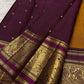 Antique gold Kanjeevaram silk saree with traditional zari close-up
