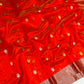 Gold and silver leaf-shaped buttas woven across a Vermilion Red Pattu Silk Chanderi saree