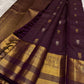 Gold and silver zari buttas scattered across the Kathiri Purple silk.