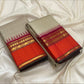 Orange Rettapet border with maanga pet, yaanai pet, vanki pet and muthuseer gold zari motifs on a biscuit beige Kanchipuram saree