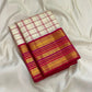 Gold zari border detail on the ivory raspberry pink Kanchipuram saree