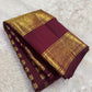 Close-up of petite Mail buttas aligned in regular rows across the Deep Burgundy body