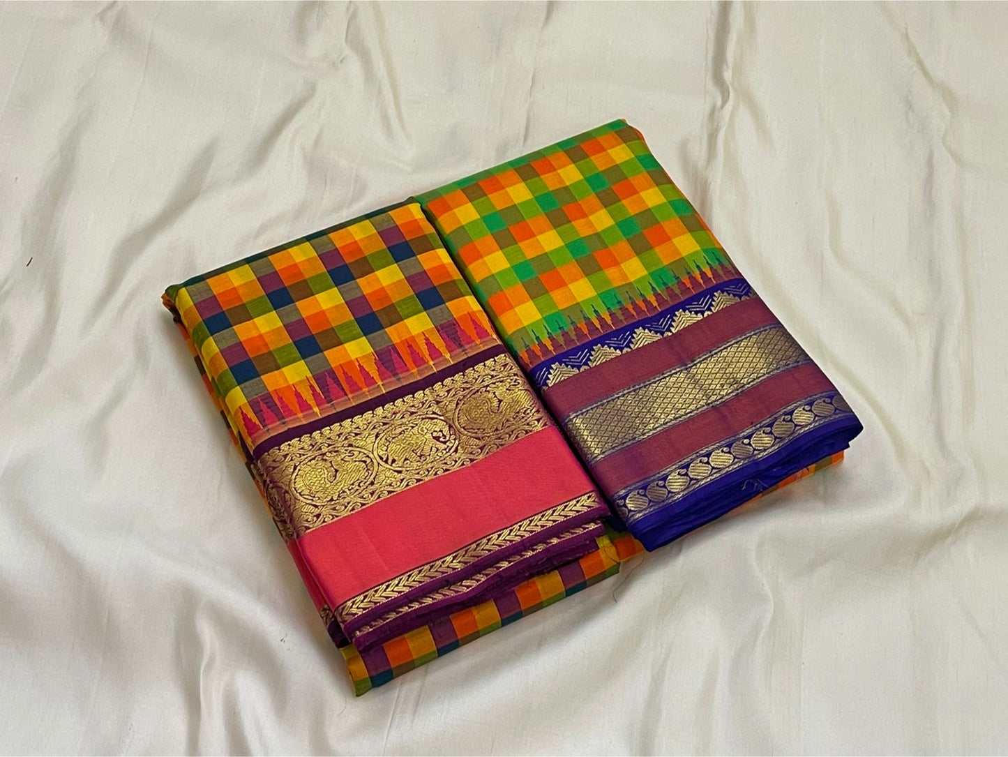 Full length display of pure Kanchipuram silk saree with vibrant multicolor checks and contrast purple border
