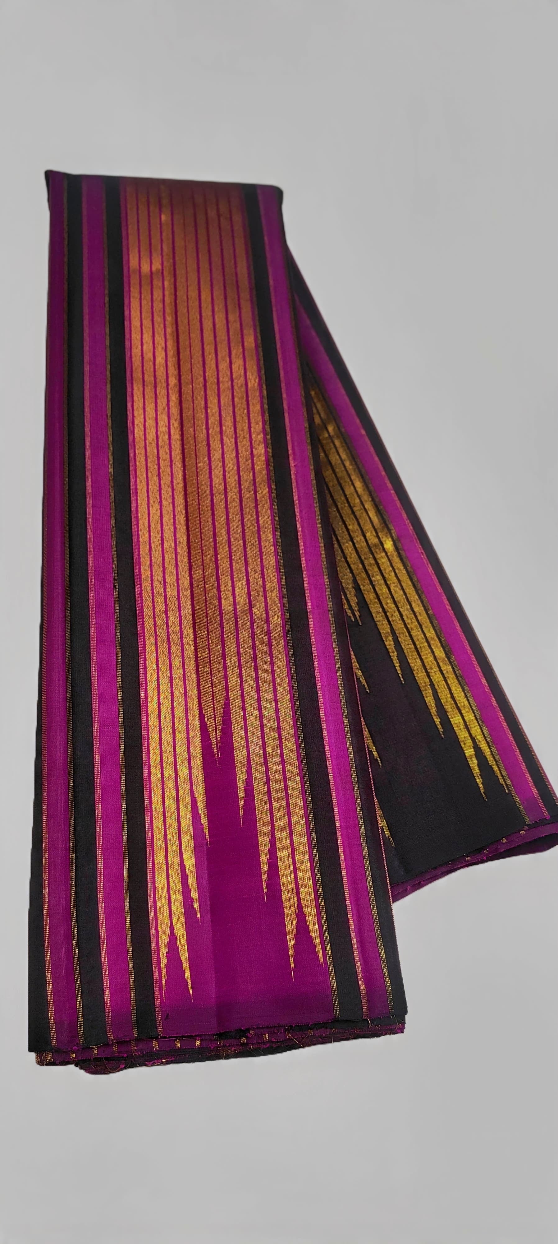 Gold zari stripe detail on dark chocolate brown Kanjivaram silk saree