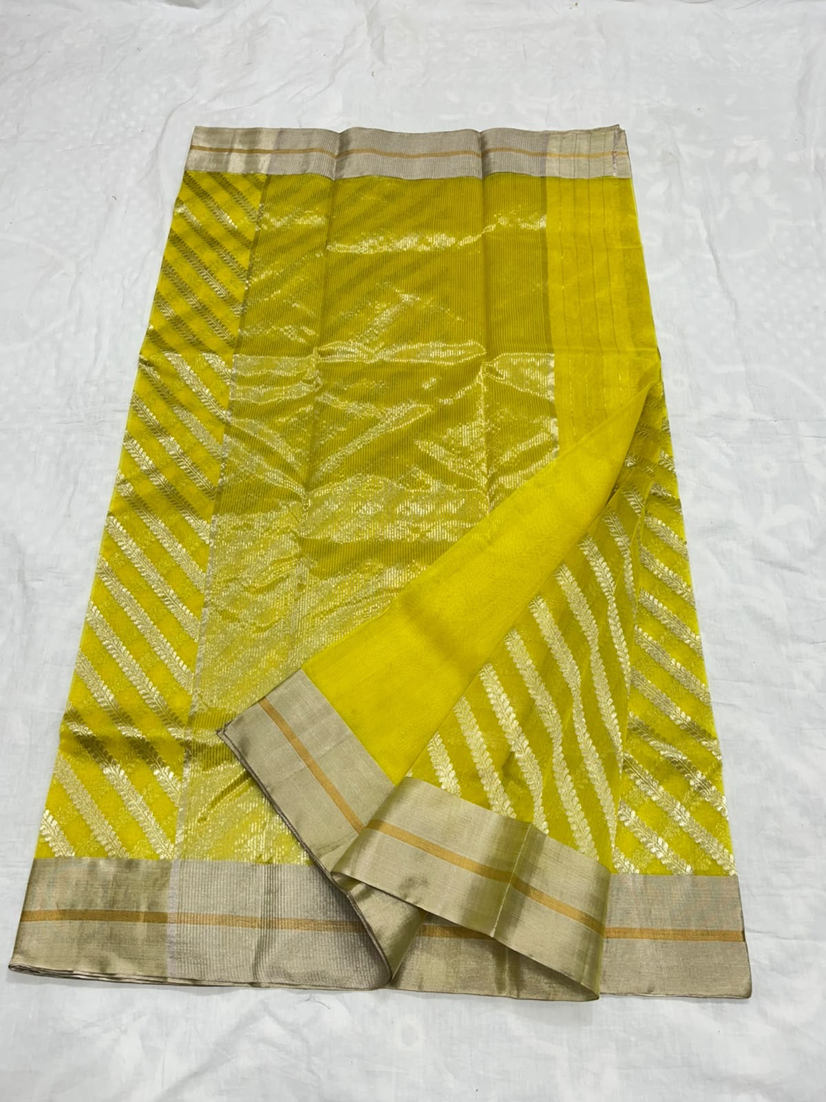 Sunlit Turmeric Yellow Diagonal Zari Katan Silk Chanderi Saree, luminous silk texture close-up