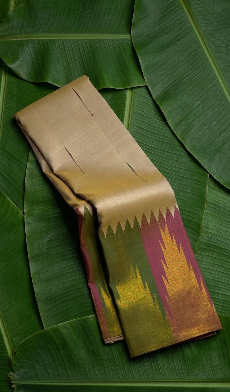 Golden ivory handwoven Kancheepuram pure silk saree with self-colour ettukol border on banana leaf — Idam Living