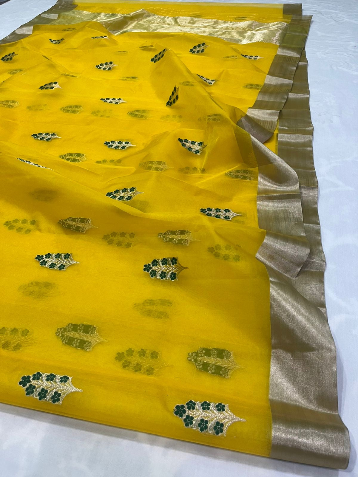 Mustard yellow pure silk Chanderi handloom saree with silver zari borders and woven motifs