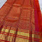 Handwoven Chen buttas spaced across the striped silk body of the golden mustard vermilion Vairaoosi saree.