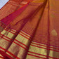Close view of the golden mustard body with needle-fine Vairaoosi stripes and zari threads.