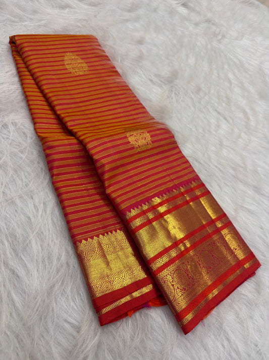 Displayed pallu of Vairaoosi saree showing richly woven zari lattice work and decorative Rudhraksham motifs.