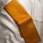 Golden turmeric Kancheepuram Butta silk saree — zari butta motif close-up