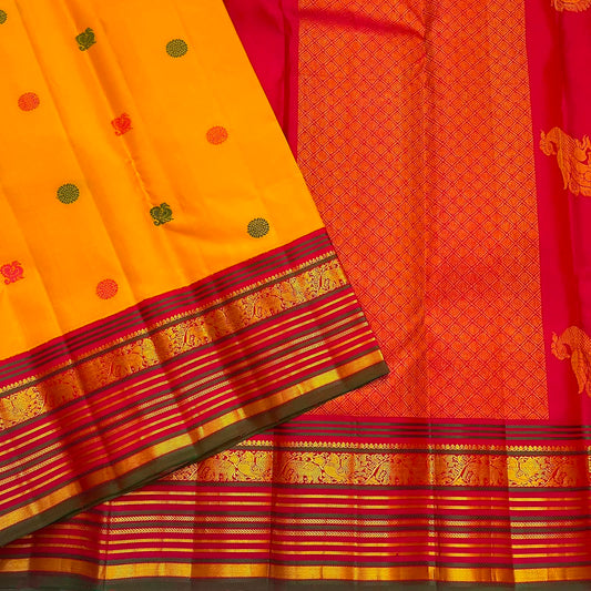 Golden turmeric Kanchipuram silk saree with colourful silk thread floral and elephant buttas.