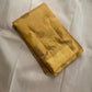Broad Varisaipet border with ornate handwoven gold zari motifs on Butter Yellow silk