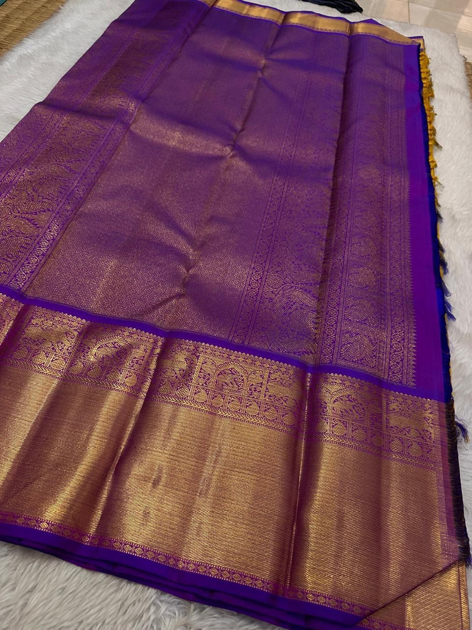 Golden Turmeric Yellow Kancheepuram Saree — pallu detail with gold zari elephant motifs