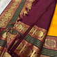 Golden yellow Kanjipuram silk saree with deep maroon border close-up