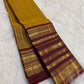 Turmeric yellow handwoven pure silk Kanjeevaram saree with Arakku maroon Varisaipet border and oosivaanam zari — Idam Living