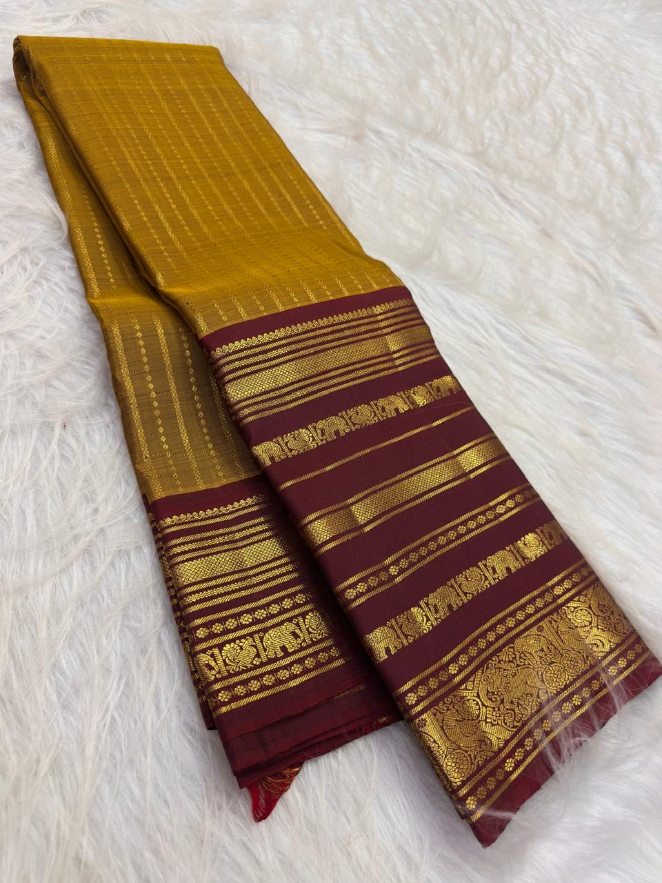 Turmeric yellow handwoven pure silk Kanjeevaram saree with Arakku maroon Varisaipet border and oosivaanam zari — Idam Living