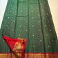Handwoven Zari Kattam saree with Arakku Red border and antique-gold traditional weaving.