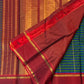 Green and cobalt blue handwoven Pure Silk Kanjivaram Kanchi Kattam saree with gold grid lines and red Rettapet border, body weave detail