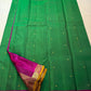 Magenta petite border with fine gold zari edge on green Kancheepuram saree
