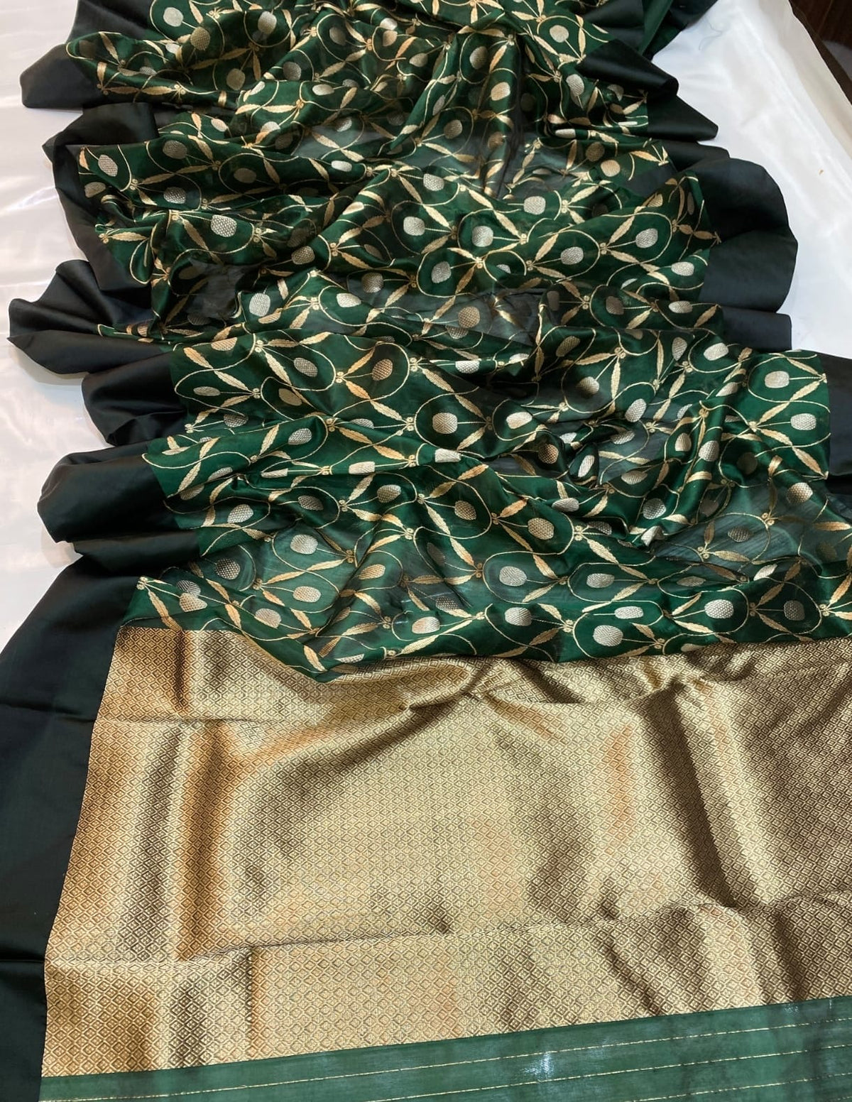 Plain black contrast border on forest green Pattu Silk Chanderi