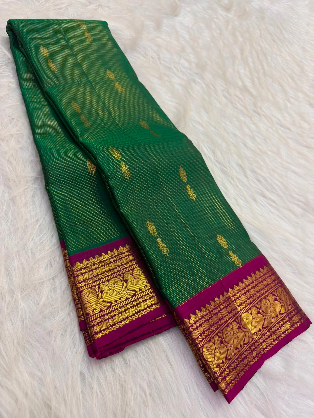 Fine Vairaoosi zari lines on emerald-green pure silk KanchiPattu saree