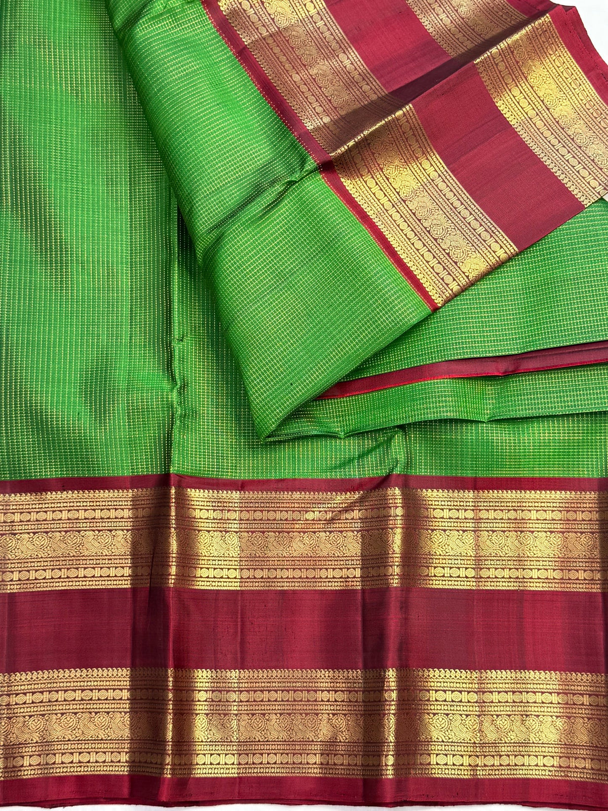 Leaf green handwoven Kancheepuram silk with gold Zari Kattam checks