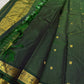 Dark bottle green Kanjipuram silk saree folded showing Zari Kattam grid body with Pavun butta and ornate self-colour Mayil border