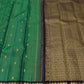 Handwoven Pure Silk Kanjipuram saree in emerald green with navy contrast and richly woven classic-gold zari.
