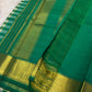Fresh Green and Ivory Lightweight Kanchipuram Kattam Saree with Seer Pallu showing checked silk body