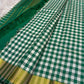 Fresh Green and Ivory Lightweight Kanchipuram Kattam Saree with Seer Pallu showing ivory green checks