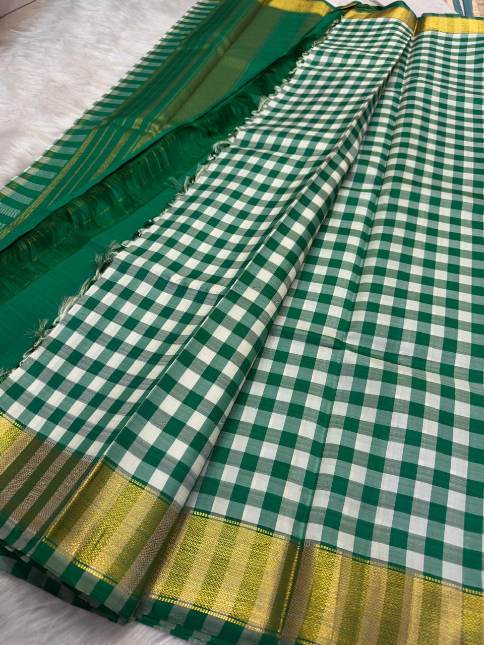 Fresh Green and Ivory Lightweight Kanchipuram Kattam Saree with Seer Pallu showing ivory green checks