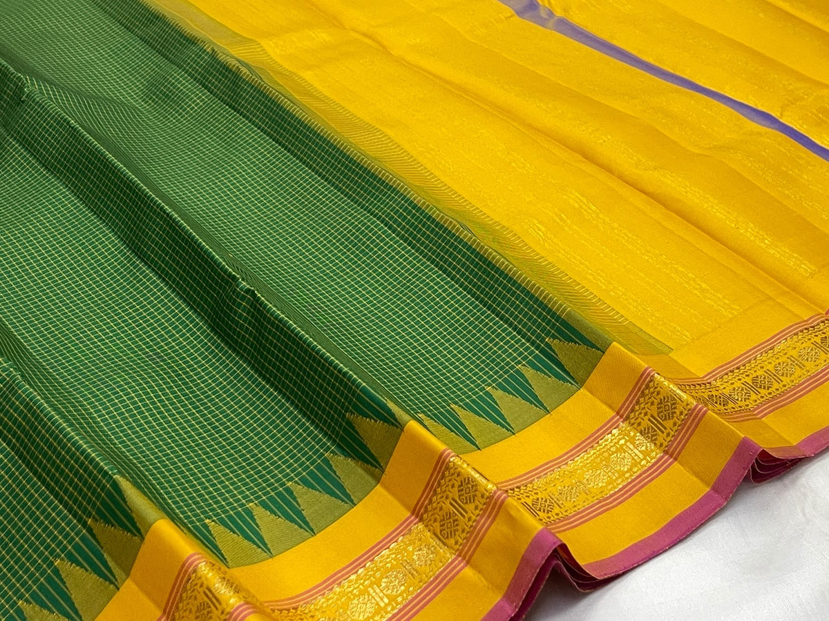 Deep Green Handwoven Pure Silk Kanjivaram Kanchi Kattam Saree with Manjal Pillayar Rekku Border