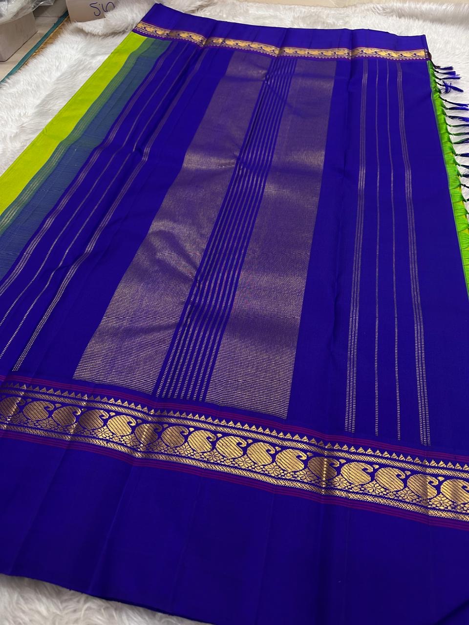 Parrot Green Handwoven Pure Silk Kanchipuram Korvai Saree with Kaal Irangiya Gold Zari Border