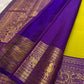 Green Kanchipuram saree with deep purple Annam motif border