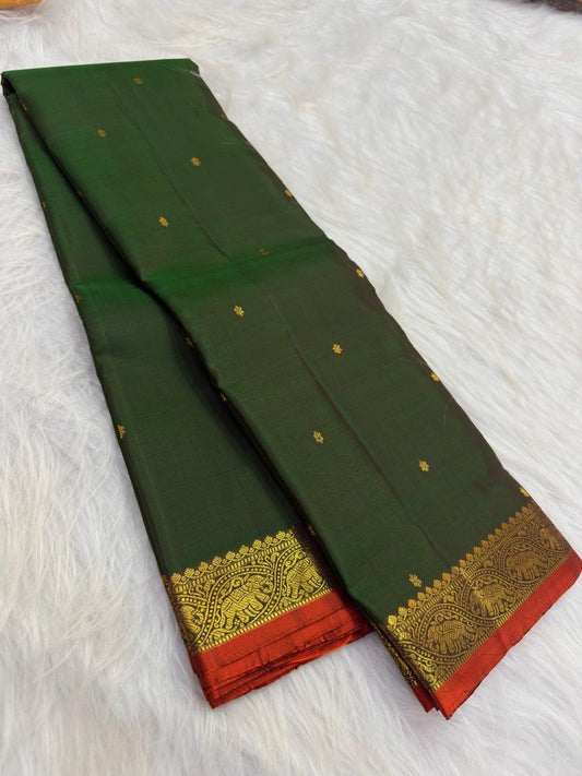 Forest Green Handwoven Pure Silk Kanjeevaram Saree with Small Gold Buttas & Petite Zari Elephant Border
