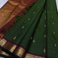 Pure Kanchipuram Silk Saree laid out with deep green zari kattam checks, gold motifs, and maroon zari woven border, available in the USA