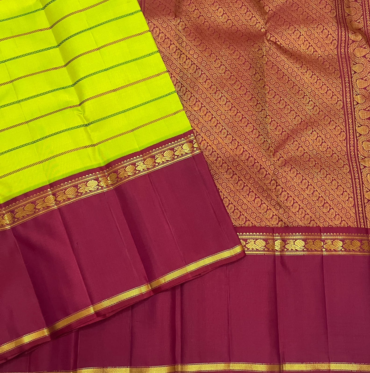 Kili Pachai Green Handwoven Pure Silk Kanjipuram Saree with Rettapet Border and Veldhari Stripes, folded saree presentation