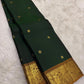 Green Kanchipuram silk saree with korvai small butta border detail