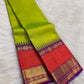 Full view of green vintage-style Kanchipuram saree with stacked seer and seepu reku pallu.