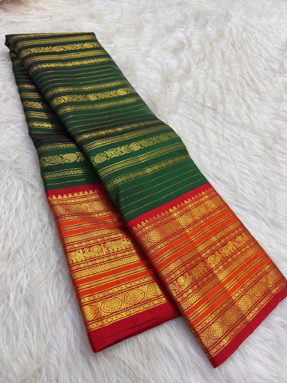 Deep Green handwoven Pure Silk Kanchipuram saree showing the full body and contrast zari border.
